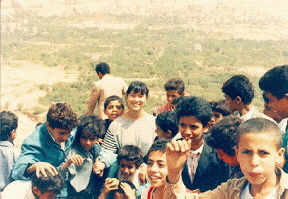 Wadi Dahar. All the kids wanted to be in the picture. [August 17, 1992]